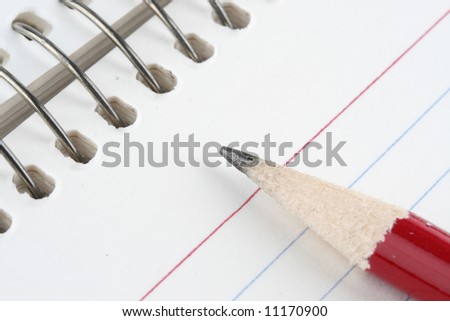 Macro shot of a pencil and paper