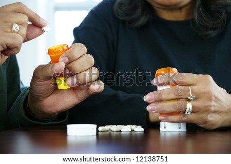 People getting ready to take their pills