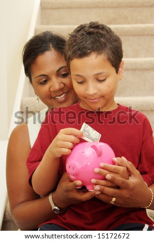 Family Holding Piggy Bank With Their Savings
