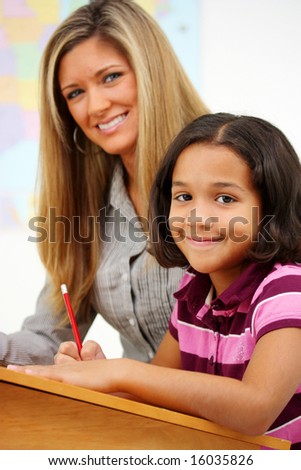 Teacher and Student In A Classroom At School