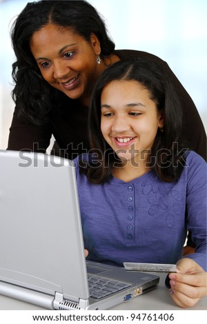 Picture of a child with computer set on white background