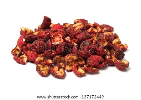 Dried chinese hawthorn fruit isolated over white background. Used in traditional herbal medicine. Crataegus.