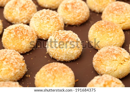 orange snowball cookies on the white background