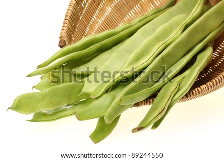 stock photo string beans in a wicker basket