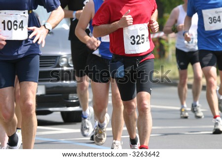 Marathon runners increasing speed for the last few kilometers of the Dusseldorf city marathon in Germany