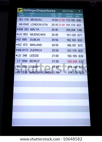 airport flight schedule screen showing the departure times to the different destinations