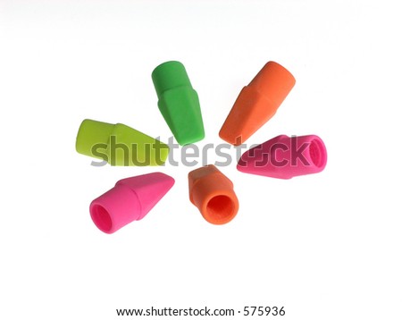 Colored pencil top rubber erasers in semi circle isolated over white