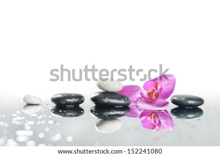 Background Of A Spa With Stones, And Orchid Flower