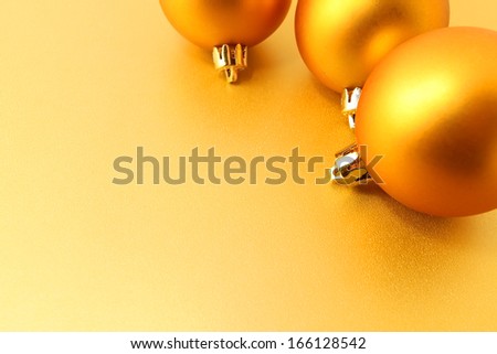 golden Christmas ball on golden background