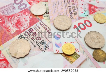 Hong Kong dollar money banknote with coins close up