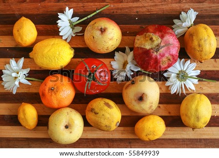 A Pile of Rotten Fruit on chopping board