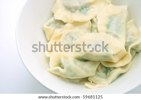 Cooked Chinese Dumplings isolated on white background