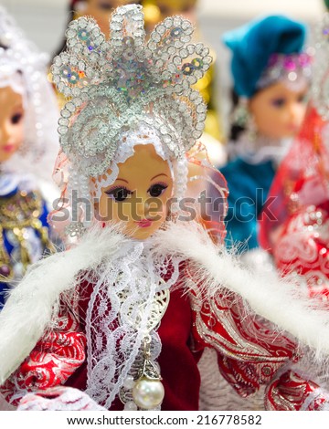 Handmade doll in traditional national russian clothing at the flea market in Moscow (Russia).