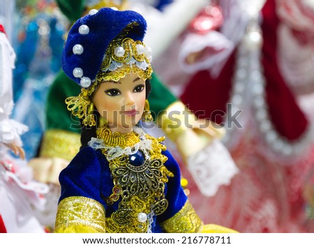 Handmade doll in traditional national russian clothes at the flea market in Moscow (Russia).