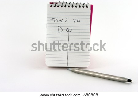 Things To Do note pad and pen on white background