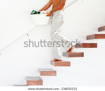 man climbing down of stairs