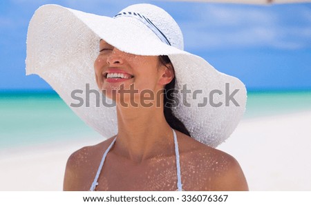 woman wearing hat in summer