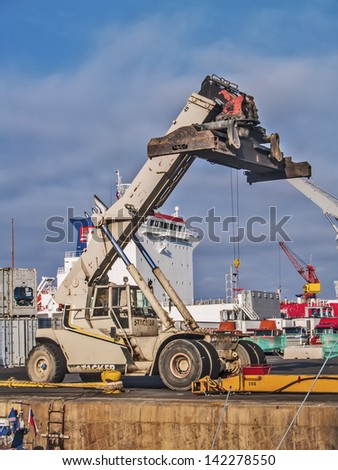 VALPARAISO, CHILE - FEBRUARY 6: Mobile crane at industrial dock on February 6, 2011 in VAlparaiso, Chile. Valparaiso is the main port in Chile.