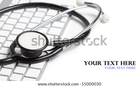 Stethoscope on a modern keyboard isolated on white with space for text Stethoscope on a modern keyboard isolated on white with space for text