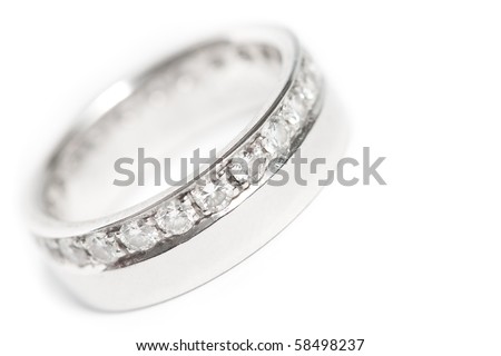 stock photo Diamond wedding ring on white background