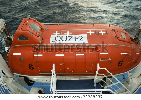 A ready to launch life raft on a large passenger ship