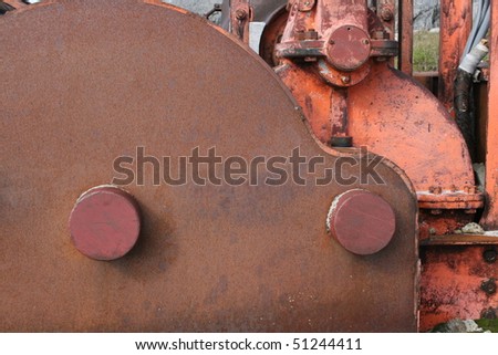 An old rusty industrial winch