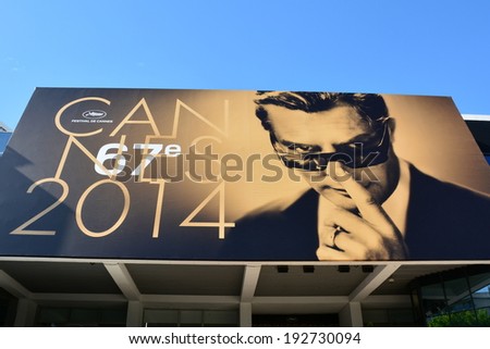 CANNES, FRANCE-MAY 13: the poster for the 67th International Film Festival shown on may 13, 2014 in Cannes, France. This year the artist chosen is the famous italian actor Marcello Mastroianni.