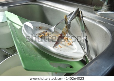 Dirty dishes Abandoned dirty dishes in sink