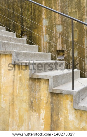 Yellow Stairs Concrete stairs of colonial architecture in Mexico.