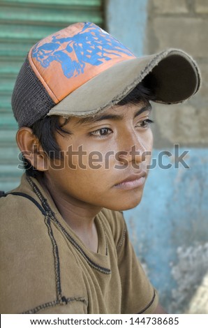 Latin american teen Great glance portrait from a young boy in the southern border of Mexico