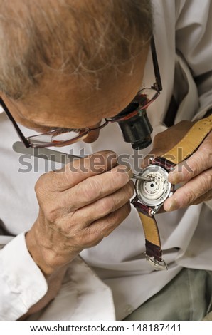 An experienced watch repair man  Watch repair done with great care