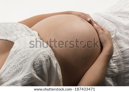 Full Pregnancy Majestic belly of a pregnant woman in her 9 months of pregnancy