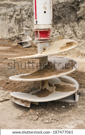 Huge drilling auger  Close up of a dirt drill used to open up holes in construction sites