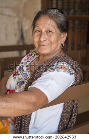 Portrait of a Mayan woman in Yucatan. Sincere and deep smile of a native woman in Yucatan, Mexico