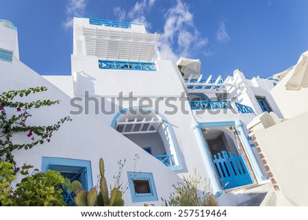 Greek style house, Santorini island White and blue house colors of Santorini island, famous travel destination