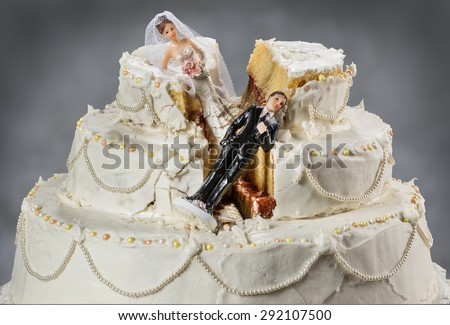 Bride and groom figurines collapsed at ruined wedding cake 
Spouses always seem to struggle to keep their relationship alive
