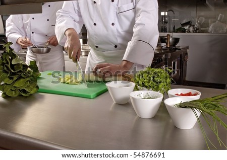 Chefs Cooking, Cutting and preparing  next plate