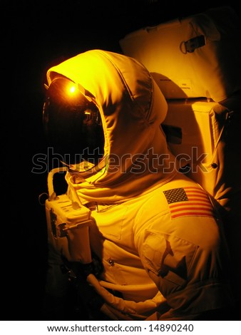 A complete astronaut setup under dramatic lighting.