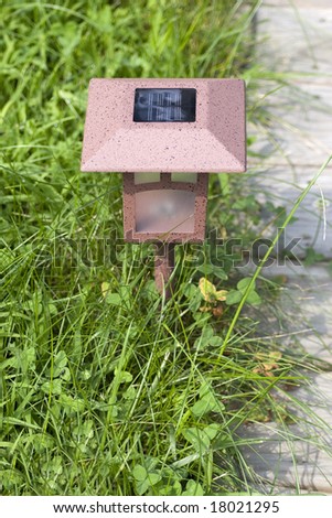 A solar powered garden lamp - these save electricity and are very eco friendly.