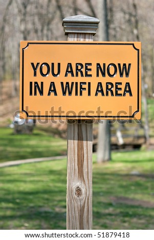 A sign that reads YOU ARE NOW IN A WIFI AREA indicating a wireless hotspot for internet use.