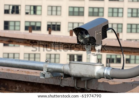A modern day traffic cam used for surveillance by governmental law enforcement authorities.