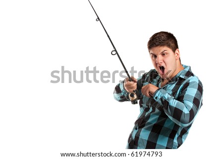 A teenager is surprised as he reels in a big fish.  Isolated over white in studio with plenty of negative space.