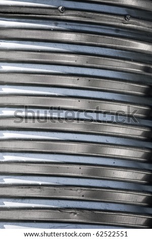 Silver galvanized metal with a corrugated texture.
