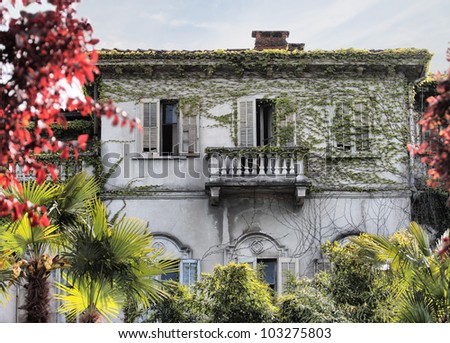 abandoned Victorian  vine-covered house in Stresa, Italy