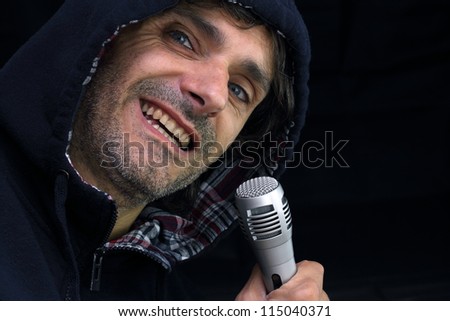 Rockstar singing over black background