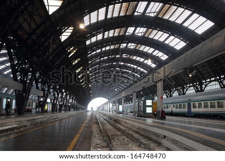 MILAN, ITALY - OCTOBER 22: the Central Train Station interior in a wide-angle view on October 22, 2013 in Milan, Italy. Milano Centrale is the Italian second-largest station.