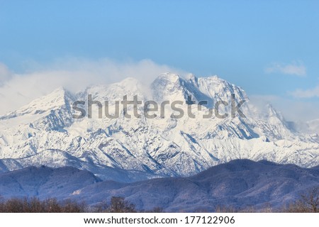 Mount Rose wrapped in clouds italian Alps  in winter time
