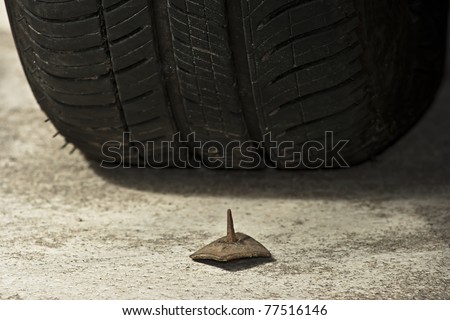 stock photo : nail and tyre. Save to a lightbox ▼. Please Login