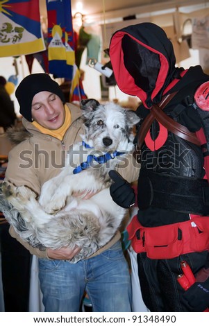 NOVARA, ITALY - DECEMBER 18: Hero in costume meets his fan in  \