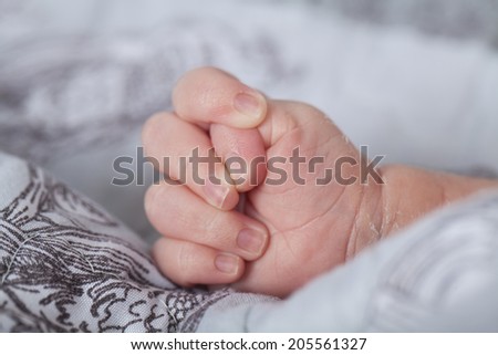 baby hands detail, studio picture